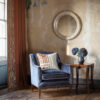 Bespoke, handmade armchair in velvet with embroidered cushions, luxury mirror and traditional side table. - Beaumont & Fletcher