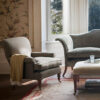 Bespoke, handmade armchair in linen with luxury sofa and bespoke ottoman. - Beaumont & Fletcher