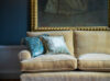 Bespoke handmade sofa in beige mohair with embroidered cushions and bespoke lighting. - Beaumont & Fletcher