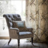 Bespoke, handmade armchair in velvet with embroidered cushions and drapes. - Beaumont & Fletcher