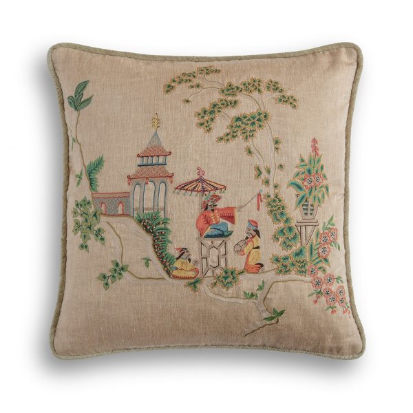 A hand embroidered designer cushion with a chinoiserie inspired design on the front