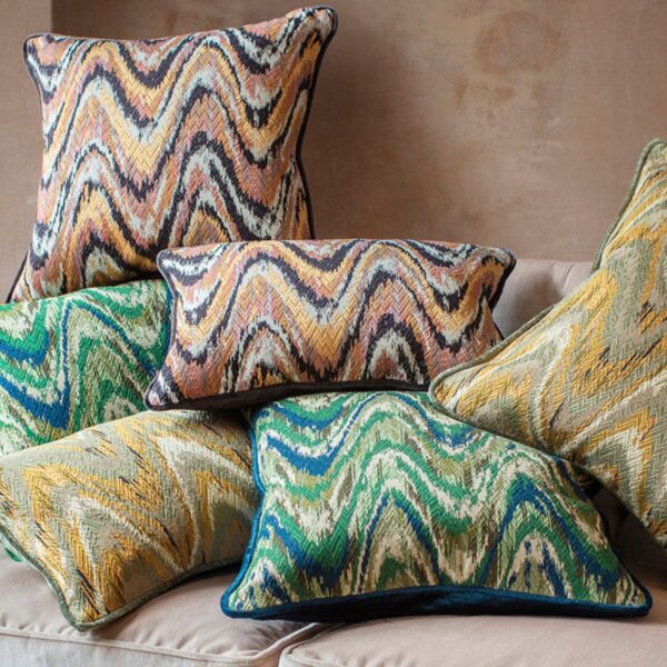 A collection of luxurious, handmade cushions in a flame stitch fabric