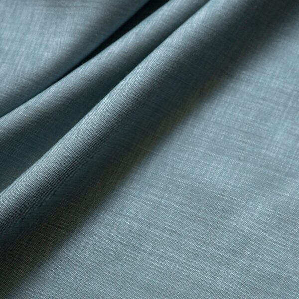 A swatch of a pale blue silk fabric