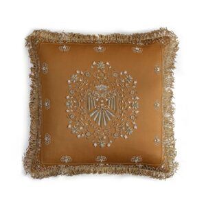 A luxurious yellow hand embroidered cushion