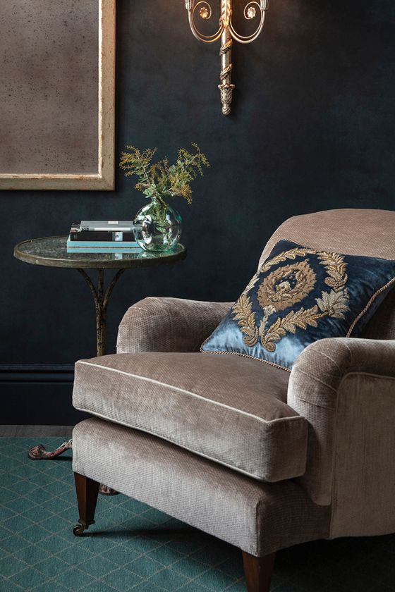A classic club chair upholstered in a luxurious velvet