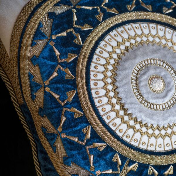 A luxurious hand embroidered cushion