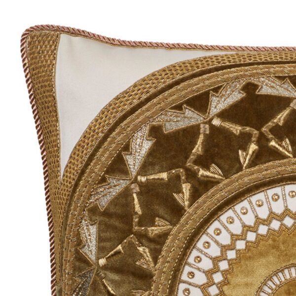 A highly decorative, hand embroidered cushion with metallic threads and applique