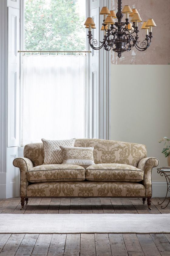 A Georgian style sofa in a contemporary damask fabric